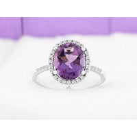 14K White Gold Halo Ring with Oval Amethyst and Pave Set Diamond Accents - 2.35 Carat Amethyst and 0.21 Carat Total Diamond Weight - Royal Jewelry