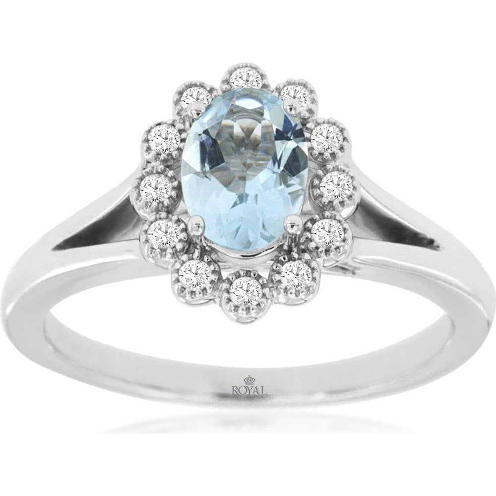 14K White Gold Halo Ring with Oval Aquamarine and Round Diamond Accents - 0.68 Carat Aquamarine and 0.12 Carat Total Diamond Weight - Royal Jewelry