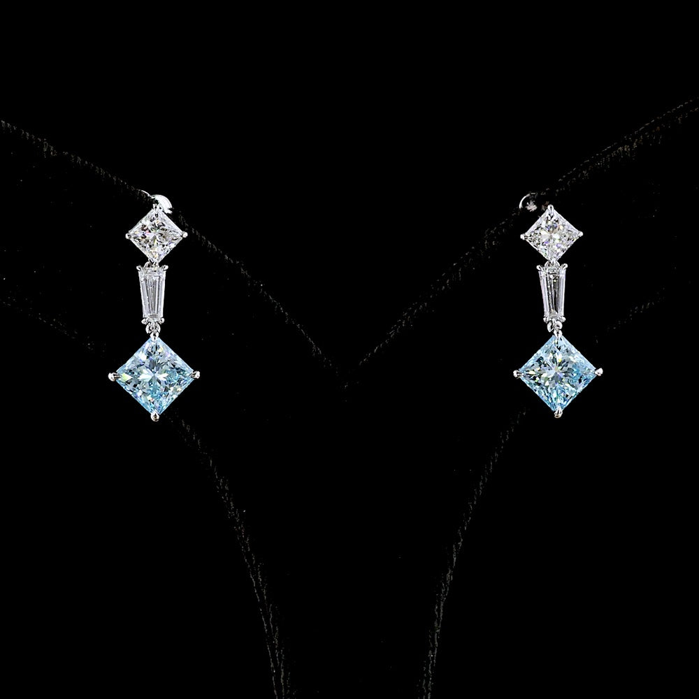 14K White Gold Hanging Earrings with Princess Cut Fancy Vivid Blue Lab Diamonds and Tapered Baguette Accents - 4.48 Carats Total Diamond Weight - Covaloro Fine Jewelry