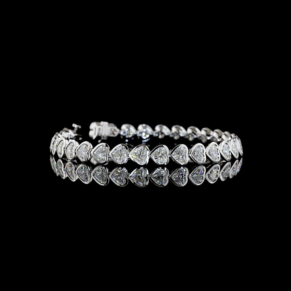 14K White Gold Heart Shape Tennis Bracelet with East-West Bezel Set Lab Diamonds - 12.28 Carats Total Diamond Weight - Covaloro Fine Jewelry
