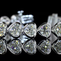 14K White Gold Heart Shape Tennis Bracelet with East-West Bezel Set Lab Diamonds - 15.91 Carat Total Weight - Covaloro Fine Jewelry