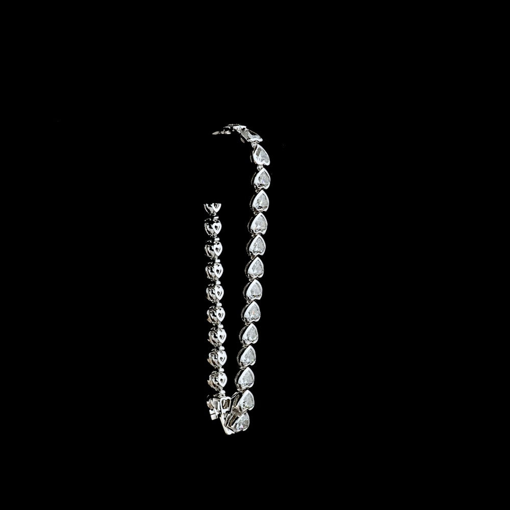 14K White Gold Heart Shape Tennis Bracelet with East-West Bezel Set Lab Diamonds - 15.91 Carat Total Weight - Covaloro Fine Jewelry