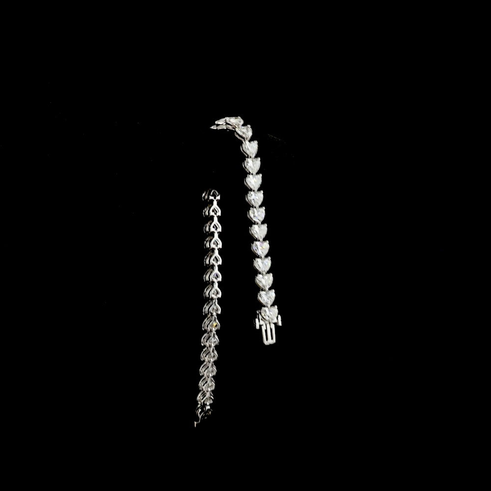 14K White Gold Heart Shaped Diamond Tennis Bracelet with East-West Setting - 16.05 Carat Total Weight Lab Grown Diamonds (E-F Color, VS2 Clarity) - Covaloro Fine Jewelry