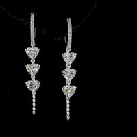 14K White Gold Heart-Shaped Hanging Drop Earrings with Three Heart-Cut Lab Diamonds and Brilliant Accents - 3.21 Carat Total Diamond Weight - Covaloro Fine Jewelry