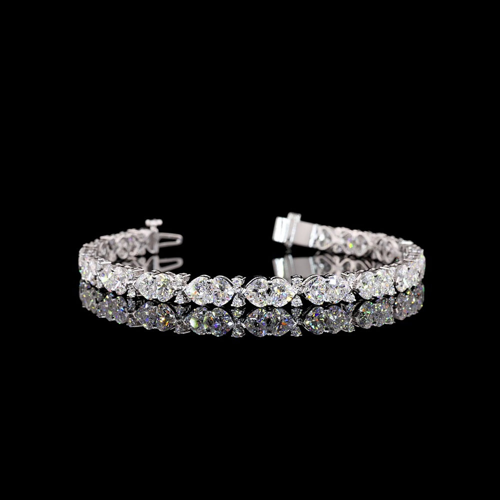 14K White Gold Heart Shaped Tennis Bracelet with East-West Set D VVS2 Lab Diamonds - 12.07 Carat Total Diamond Weight - Covaloro Fine Jewelry