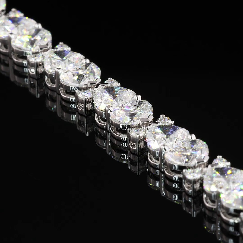14K White Gold Heart Shaped Tennis Bracelet with East-West Set D VVS2 Lab Diamonds - 12.07 Carat Total Diamond Weight - Covaloro Fine Jewelry