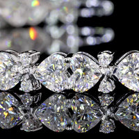 14K White Gold Heart Shaped Tennis Bracelet with East-West Set D VVS2 Lab Diamonds - 12.07 Carat Total Diamond Weight - Covaloro Fine Jewelry