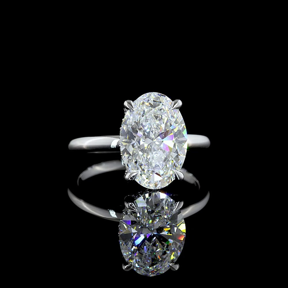 14K White Gold Hidden Halo Engagement Ring with 4.04 Carat Oval Lab Diamond (D VVS2) and 0.12 Carat Brilliant Cut Diamond Accents - North-South Prong Set, IGI Certified - Covaloro Fine Jewelry