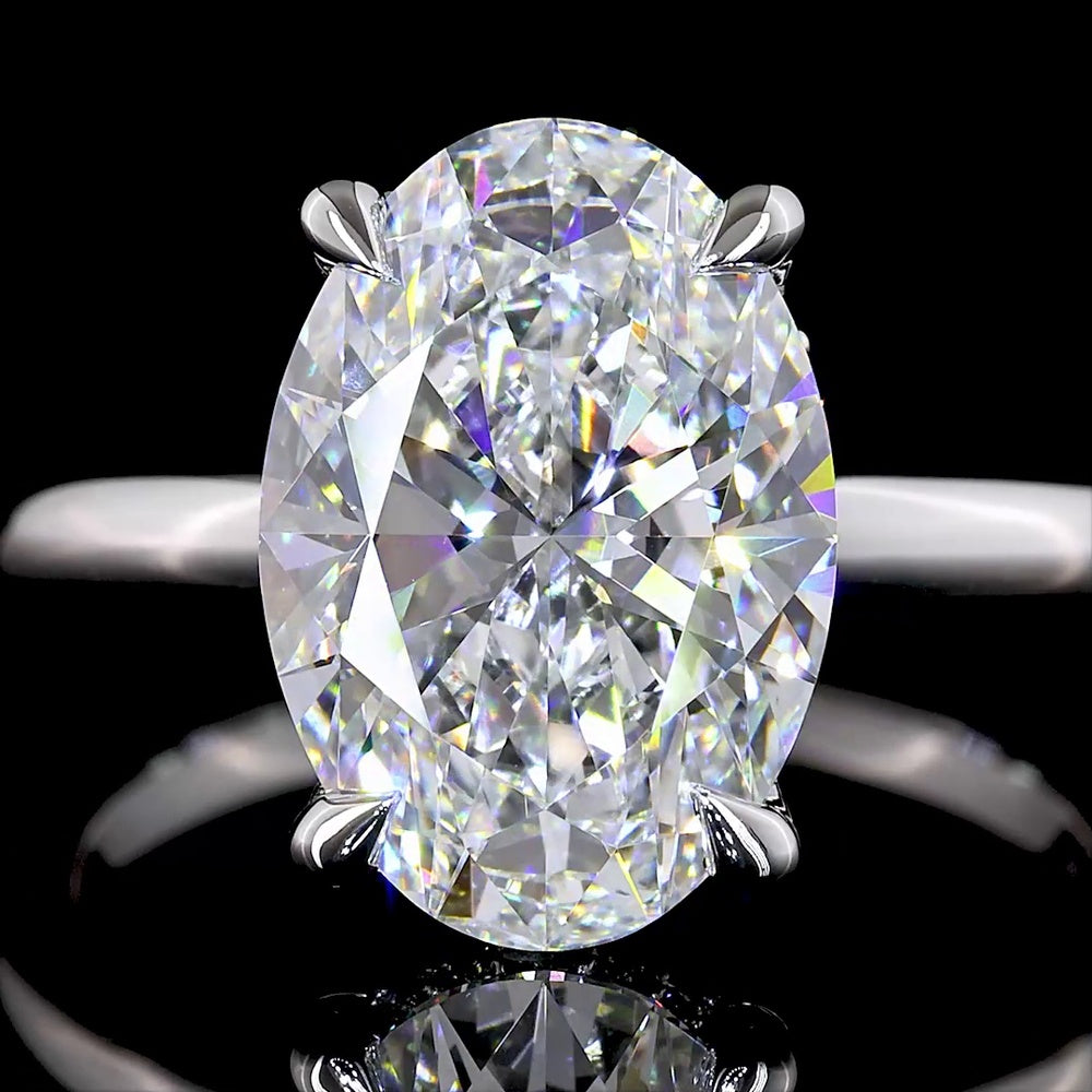 14K White Gold Hidden Halo Engagement Ring with 4.04 Carat Oval Lab Diamond (D VVS2) and 0.12 Carat Brilliant Cut Diamond Accents - North-South Prong Set, IGI Certified - Covaloro Fine Jewelry