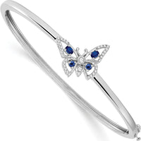 14K White Gold Hinged Bangle Bracelet with Oval Blue Sapphire and Round Diamond Butterfly Design - 0.22 Carats Total Diamond Weight by Monteluci Fine Jewelry