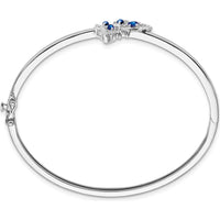 14K White Gold Hinged Bangle Bracelet with Oval Blue Sapphire and Round Diamond Butterfly Design - 0.22 Carats Total Diamond Weight by Monteluci Fine Jewelry