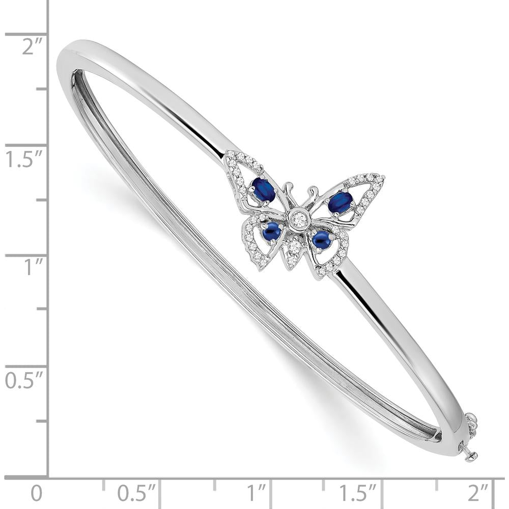 14K White Gold Hinged Bangle Bracelet with Oval Blue Sapphire and Round Diamond Butterfly Design - 0.22 Carats Total Diamond Weight by Monteluci Fine Jewelry