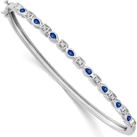 14K White Gold Hinged Bangle Bracelet with Pear Sapphire and Round Diamonds - 0.13 Carats Sapphire, 0.012 Carats Diamond by Monteluci Fine Jewelry
