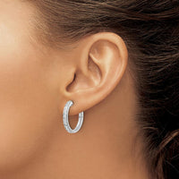 14K White Gold Hinged Hoop Earrings with Round Diamonds - 0.05 Carat Total Diamond Weight by Monteluci Fine Jewelry