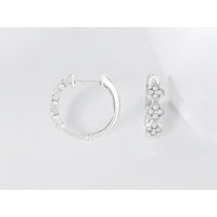 14K White Gold Huggie Hoop Earrings with Milgrain Four-Leaf Clover Diamond Clusters - 0.21 Carat Total Diamond Weight - Royal Jewelry