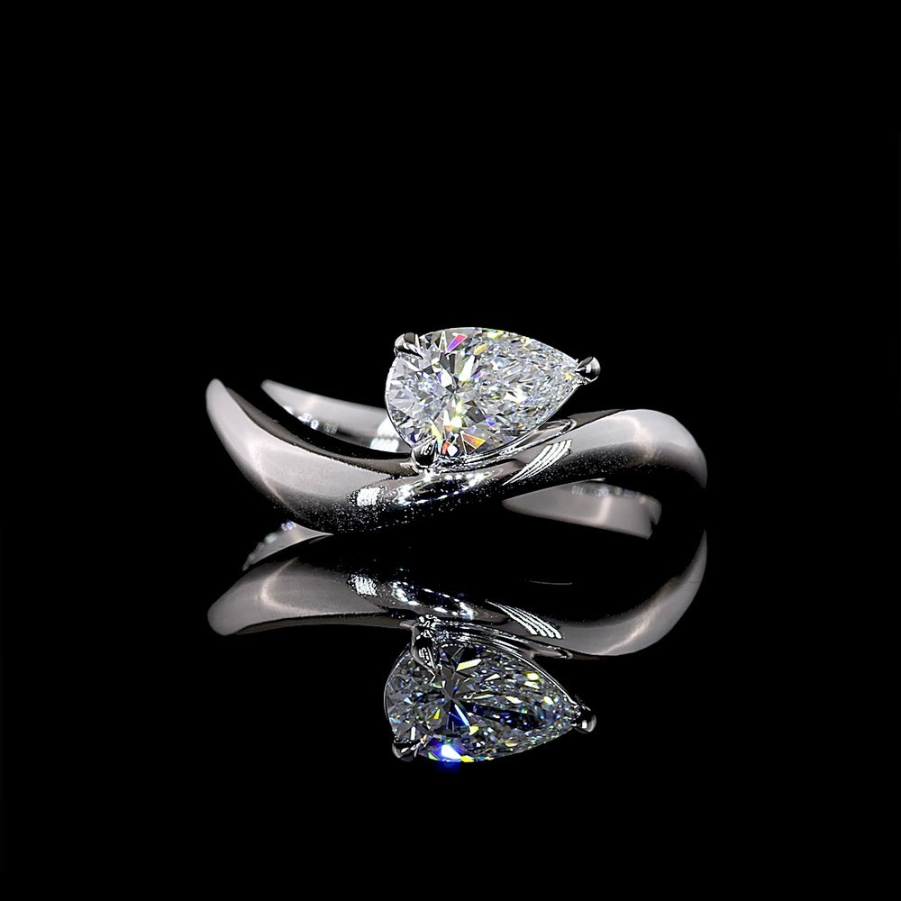 14K White Gold Inclined Pear Shape Solitaire Ring with 0.66 Carat Lab Diamond - E-F VS1 Clarity - Covaloro Fine Jewelry