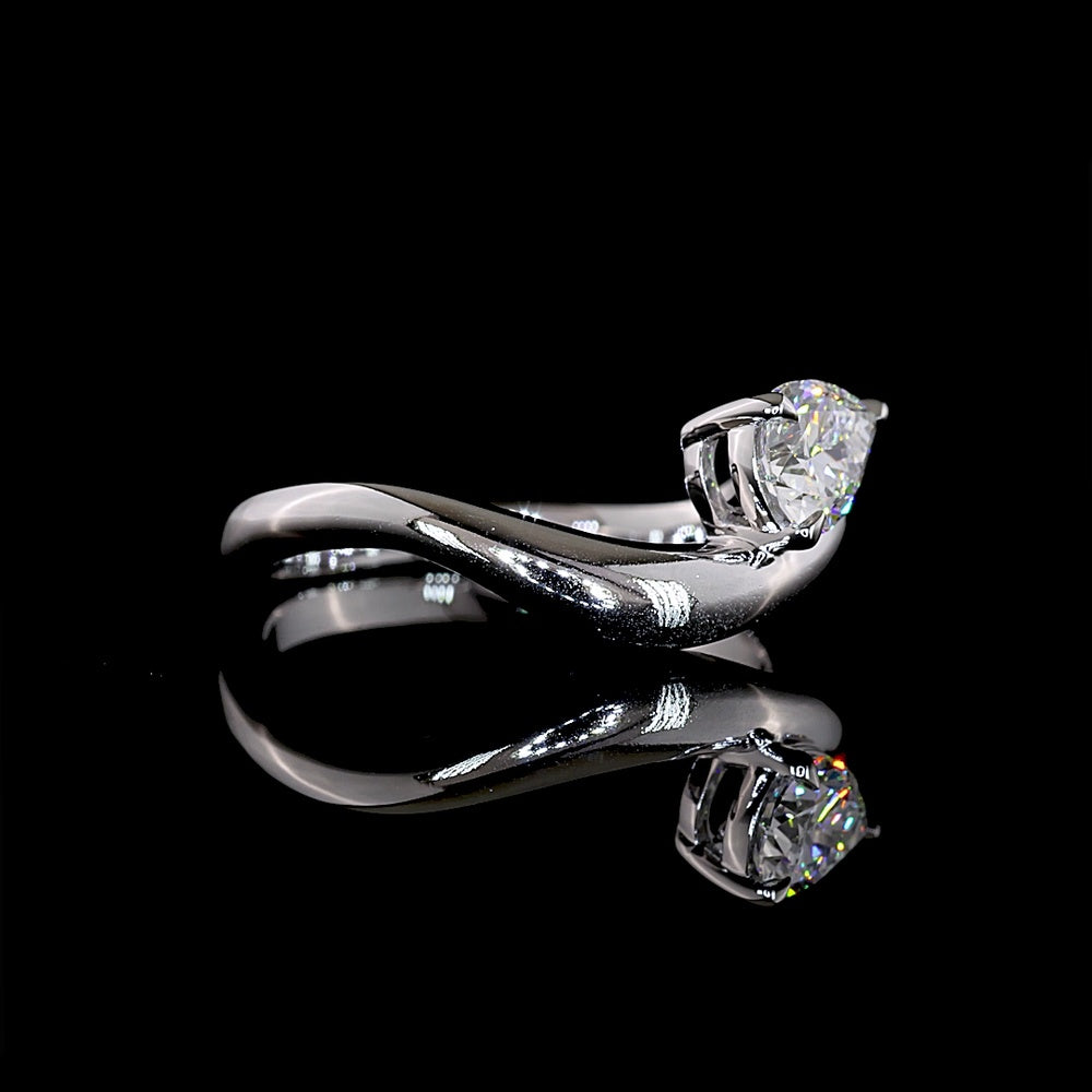 14K White Gold Inclined Pear Shape Solitaire Ring with 0.66 Carat Lab Diamond - E-F VS1 Clarity - Covaloro Fine Jewelry