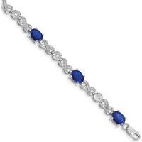 14K White Gold Infinity Link Bracelet with Oval Sapphire and Round Diamonds - 0.75 Carats Sapphire, 0.21 Carats Diamond Total Weight by Monteluci Fine Jewelry