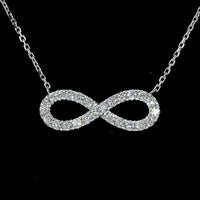 14K White Gold Infinity Motif Pendant with 24 Prong-Set Round Lab Diamonds - 0.46 Carat Total Diamond Weight, E-F Color, VS Clarity - Covaloro Fine Jewelry