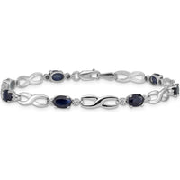 14K White Gold Infinity Sapphire and Diamond Bracelet with Oval Sapphires - 0.6 Carats Total Sapphire Weight by Monteluci Fine Jewelry