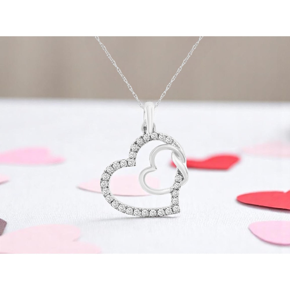 14K White Gold Interlocking Open Heart Pendant with Prong-Set Round Diamonds - 0.25 Carat Total Diamond Weight - Royal Jewelry