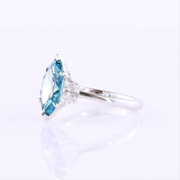 14K White Gold Marquise Cut Three-Stone Ring with 2.44 Carats Fancy Vivid Blue Lab Diamond and Half-Moon Side Diamonds - 3.05 Carats Total Diamond Weight - Covaloro Fine Jewelry