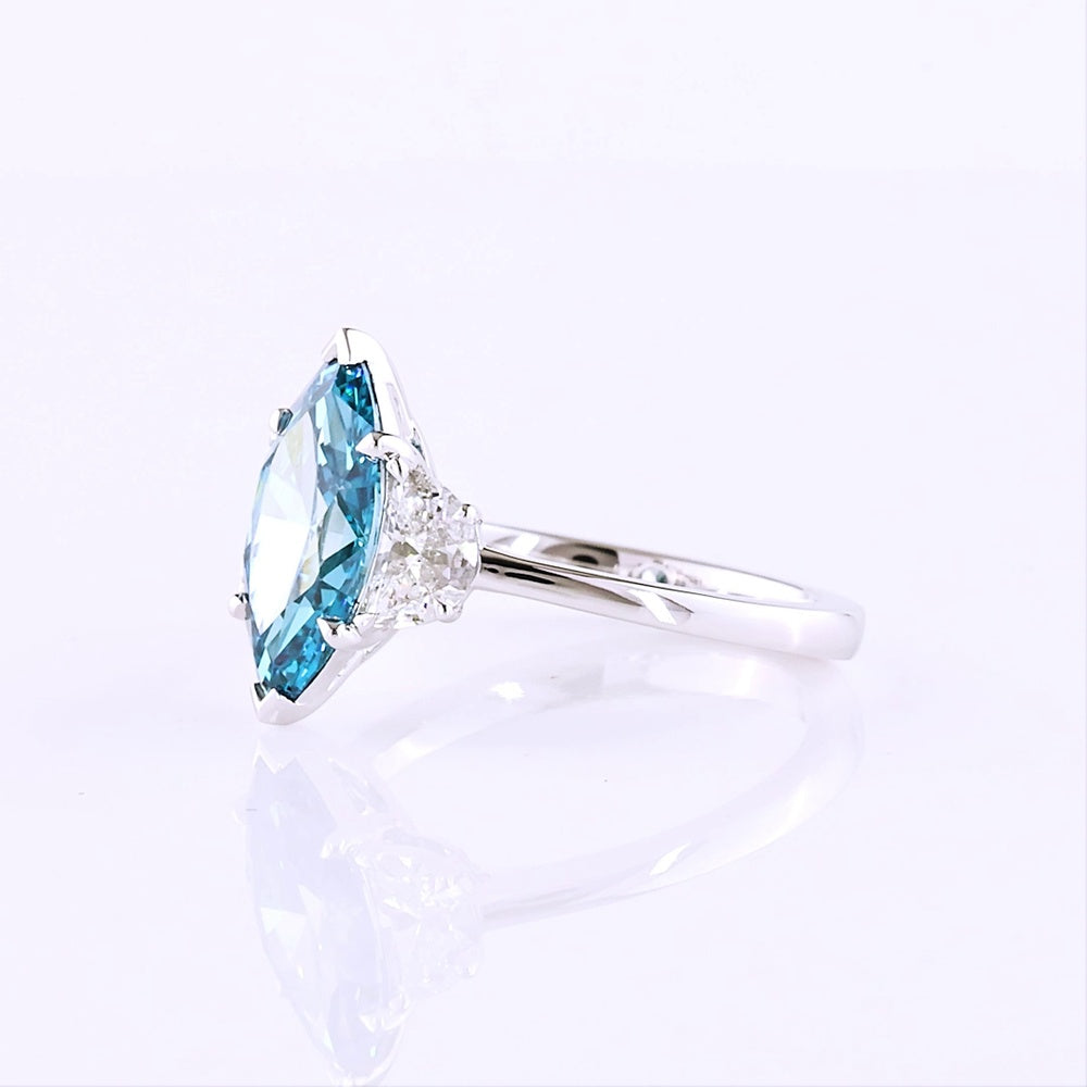 14K White Gold Marquise Cut Three-Stone Ring with 2.44 Carats Fancy Vivid Blue Lab Diamond and Half-Moon Side Diamonds - 3.05 Carats Total Diamond Weight - Covaloro Fine Jewelry