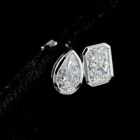 14K White Gold Mixed Shape Bezel Set Stud Earrings featuring Pear and Radiant Cut Lab Diamonds - 1.70 Carat Total Weight - Covaloro Fine Jewelry