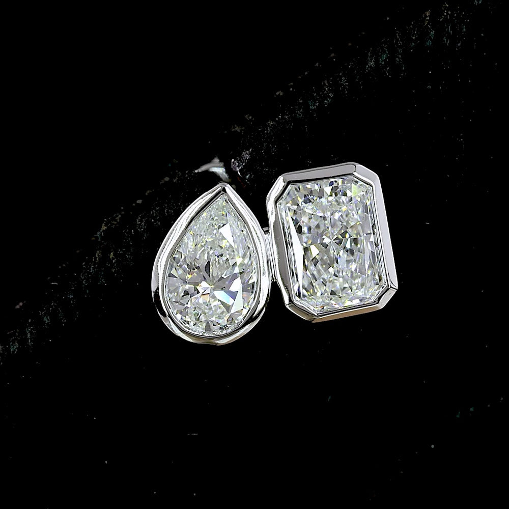 14K White Gold Mixed Shape Bezel Set Stud Earrings featuring Pear and Radiant Cut Lab Diamonds - 1.70 Carat Total Weight - Covaloro Fine Jewelry