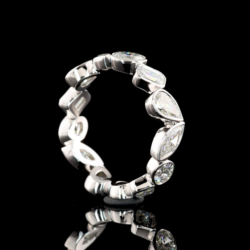 14K White Gold Mixed Shape Eternity Band with Inclined Bezel Set Oval, Pear, Marquise, and Emerald Cut Lab Diamonds - 2.78 Carats Total Diamond Weight - Covaloro Fine Jewelry