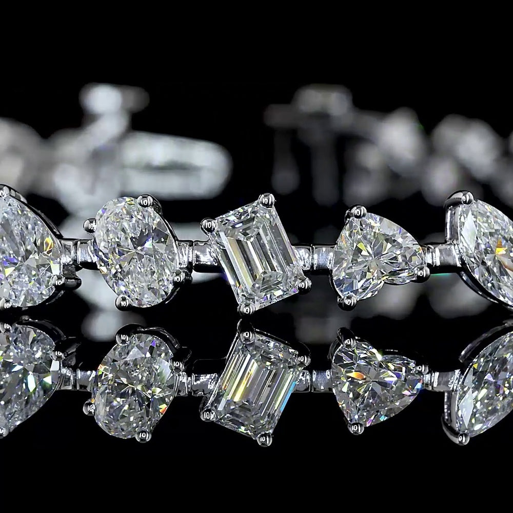 14K White Gold Mixed Shape Station Bracelet with 36 Lab Diamonds in Emerald, Oval, Pear, and Heart Cuts - 7.38 Carats Total Diamond Weight - Covaloro Fine Jewelry