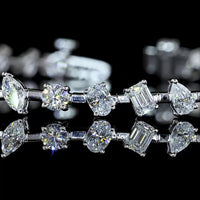 14K White Gold Mixed Shape Station Bracelet with Emerald, Oval, Pear, and Round Lab Diamonds - 3.89 Carats Total Diamond Weight - Covaloro Fine Jewelry