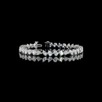 14K White Gold Mixed Shape Station Bracelet with Inclined Prong-Set Emerald, Oval, Pear, and Heart Lab Diamonds - 7.51 Carats Total Diamond Weight - Covaloro Fine Jewelry