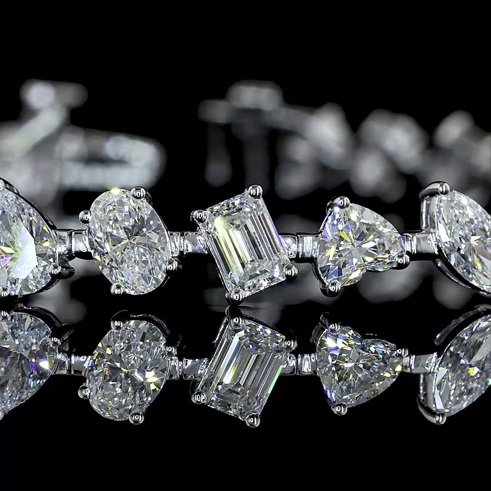 14K White Gold Mixed Shape Station Bracelet with Inclined Prong-Set Emerald, Oval, Pear, and Heart Lab Diamonds - 7.51 Carats Total Diamond Weight - Covaloro Fine Jewelry