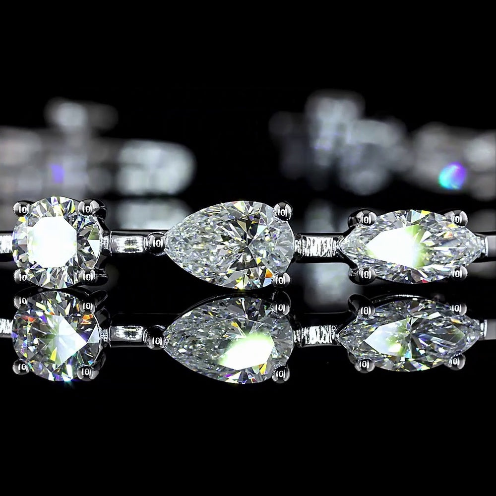 14K White Gold Mixed Shape Station Bracelet with Oval, Pear, Emerald, and Marquise Cut Natural Diamonds - 7.27 Carat Total Weight - Covaloro Fine Jewelry