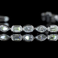 14K White Gold Mixed Shape Tennis Bracelet with Bezel Set Emerald, Marquise, and Oval Lab Diamonds - 2.46 Carat Total Weight - Covaloro Fine Jewelry