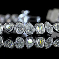 14K White Gold Mixed Shape Tennis Bracelet with Inclined Bezel Set Lab Diamonds (Emerald, Oval, Heart, Pear) - 5.56 Carats Total Diamond Weight - Covaloro Fine Jewelry