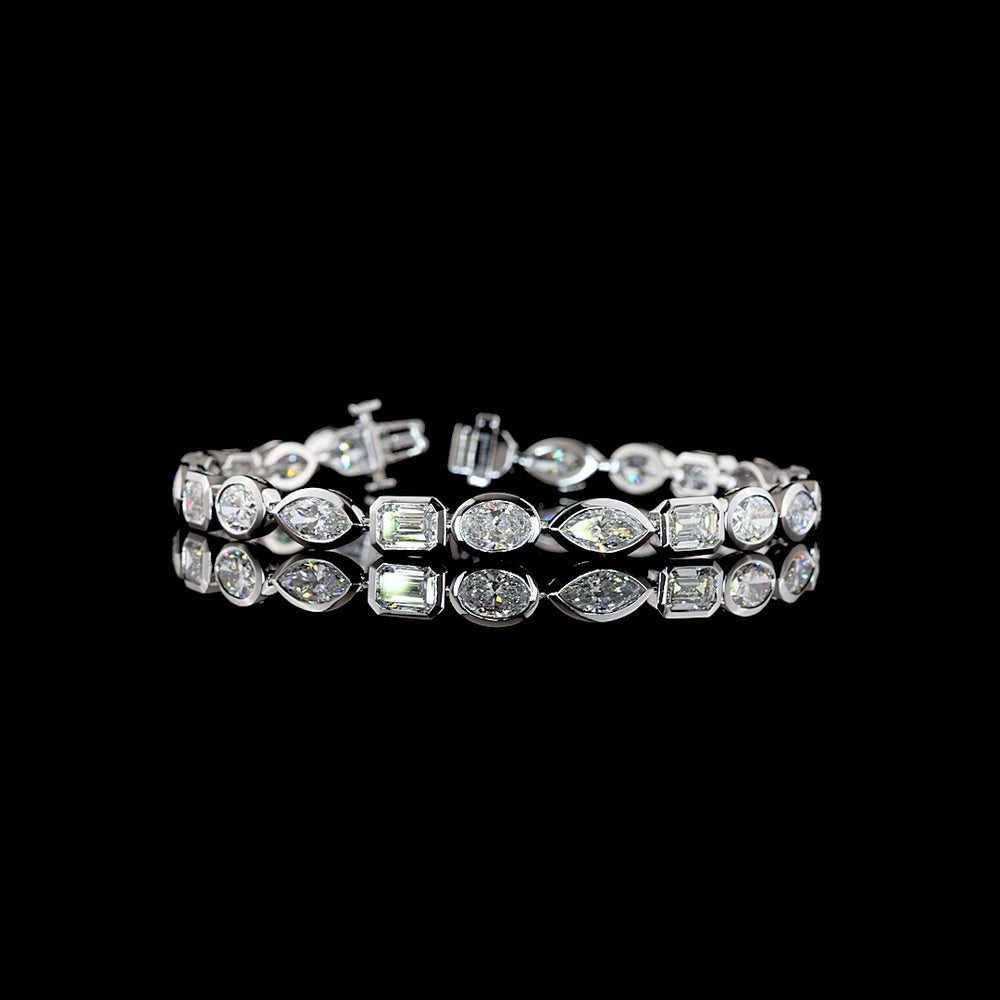 14K White Gold Mixed Shape Tennis Bracelet with Oval, Emerald, and Marquise Lab Diamonds in Bezel Setting - 12.39 Carats Total Diamond Weight - Covaloro Fine Jewelry