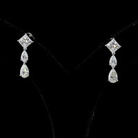 14K White Gold North-South Hanging Earrings with Princess Cut and Pear Shape Lab Diamonds - 2.97 Carats Total Diamond Weight - Covaloro Fine Jewelry