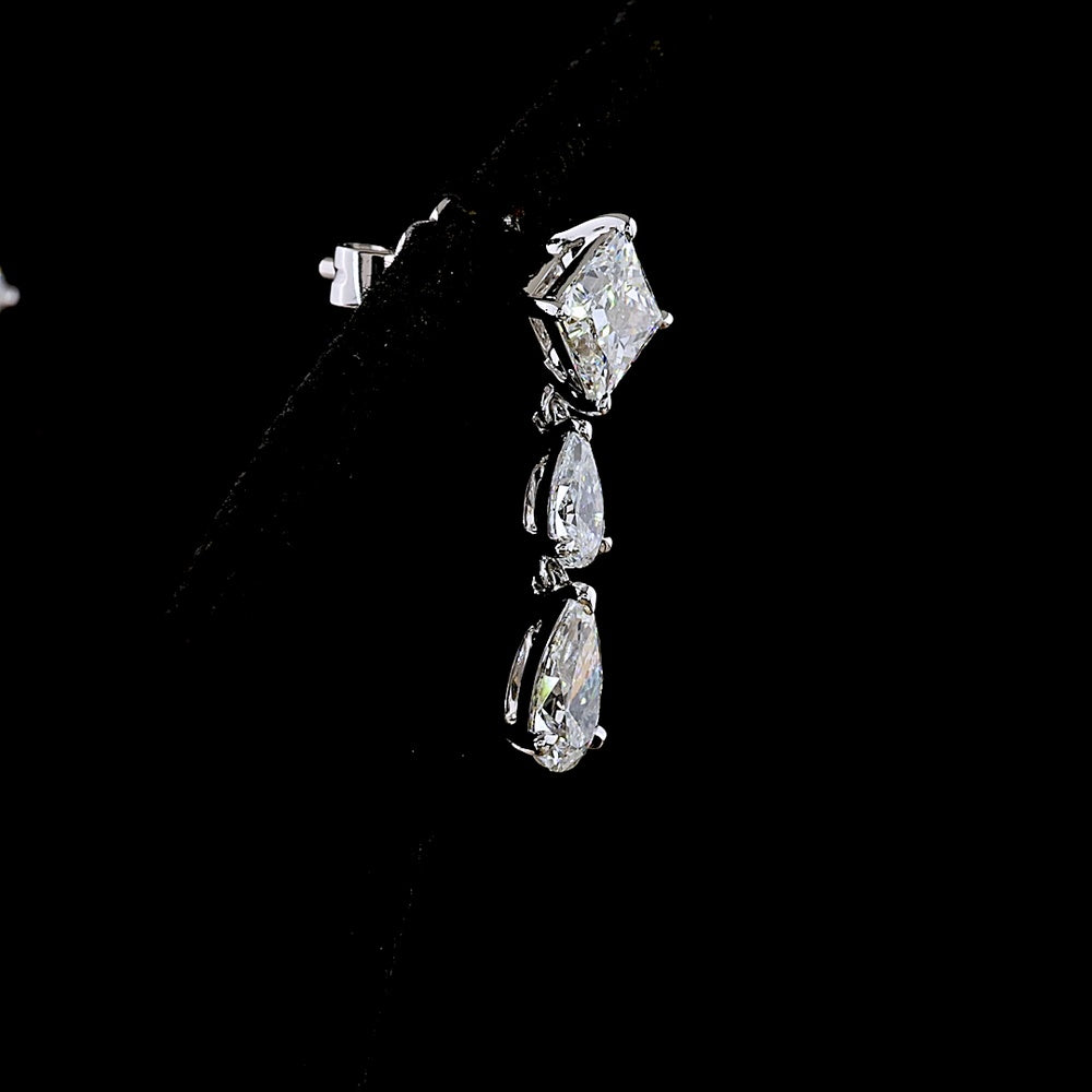 14K White Gold North-South Hanging Earrings with Princess Cut and Pear Shape Lab Diamonds - 2.97 Carats Total Diamond Weight - Covaloro Fine Jewelry