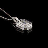 14K White Gold North-South Pendant with Bezel Set 4.57 Carat Emerald Cut Lab Diamond and Baguette Diamond Halo - 8.94 Carat Total Diamond Weight - Covaloro Fine Jewelry