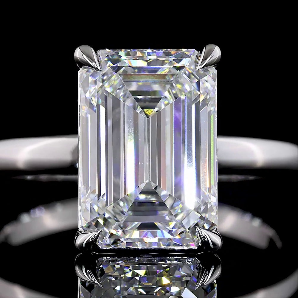 14K White Gold North-South Solitaire Ring with 4.09 Carat Emerald Cut Lab Diamond - D VVS2 Clarity, IGI Certified - Covaloro Fine Jewelry
