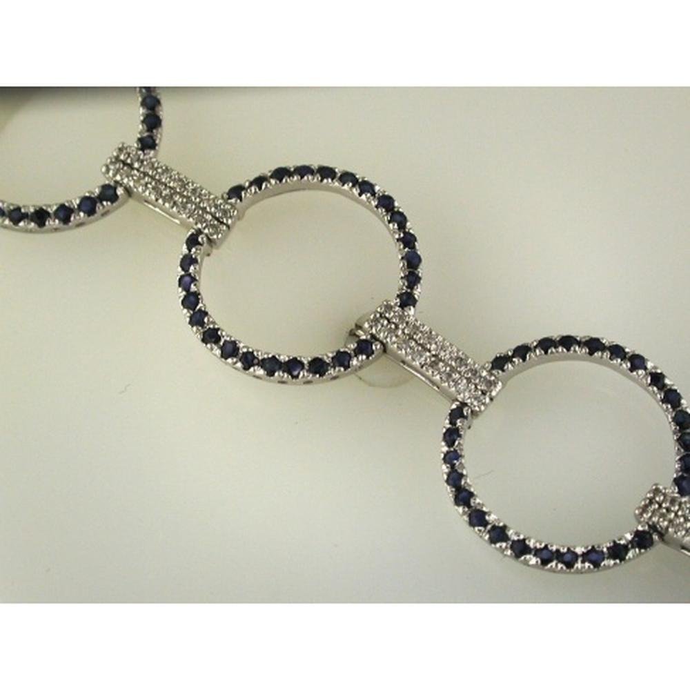 14K White Gold Open Circle Bracelet with Round Sapphires and Diamond Accents - 4.25 Carat Total Sapphire Weight and 0.45 Carat Total Diamond Weight - Royal Jewelry