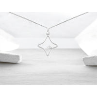 14K White Gold Open Star Pendant with Prong-Set Round Diamond - 0.02 Carat Total Diamond Weight - Royal Jewelry