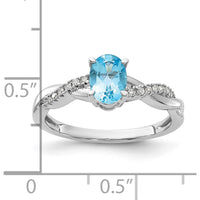 14K White Gold Oval 7x5mm Blue Topaz and Diamond Crossover Ring with 14 Round Diamonds - December Birthstone by 0
