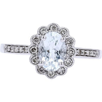 14K White Gold Oval Aquamarine Halo Ring with Milgrain Detail and Round Diamond Accents - 0.72 Carat Aquamarine and 0.18 Carat Total Diamond Weight