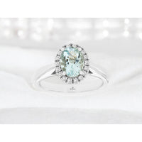 14K White Gold Oval Aquamarine Halo Ring with Round Diamond Accents - 1.10 Carat Aquamarine and 0.34 Carat Total Diamond Weight - Royal Jewelry