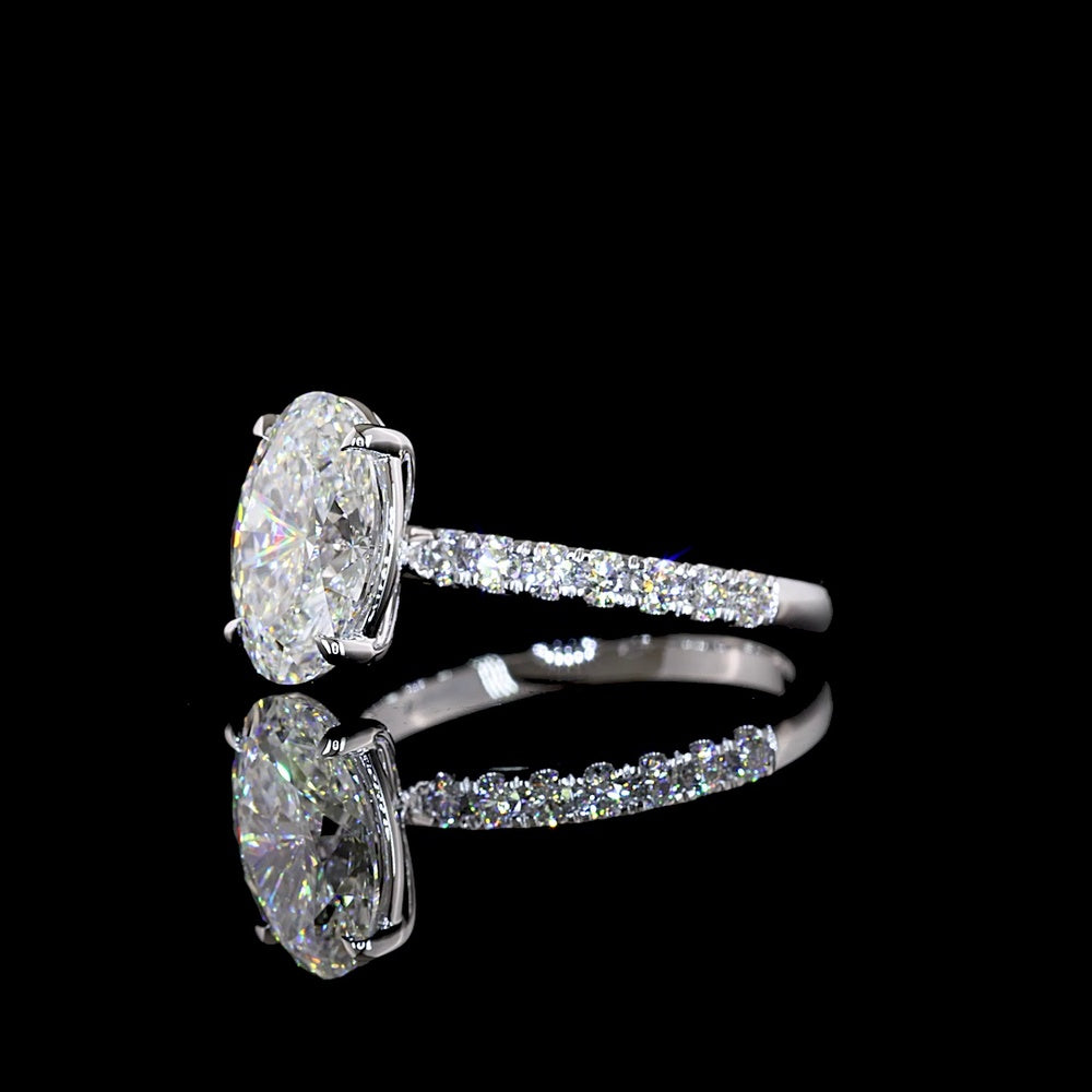 14K White Gold Oval Cut 2.57 Carat Lab Diamond Solitaire Ring with Diamond Shank and Accent Brilliant Cut Stones - 2.98 Carat Total Diamond Weight, IGI Certified E VVS2 - Covaloro Fine Jewelry