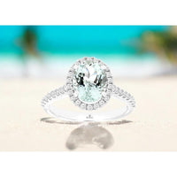 14K White Gold Oval Cut Aquamarine and Diamond Halo Ring - 1.47 Carat Aquamarine, 0.44 Carat Diamond Total Weight - Royal Jewelry