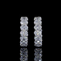14K White Gold Oval Cut Lab Diamond Huggie Earrings - 1.90 Carats Total Diamond Weight, E-F Color, VS1 Clarity, Four-Prong Setting - Covaloro Fine Jewelry